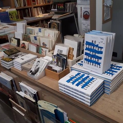 Larry book launch, book stack