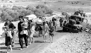 Palestine refugees (British Mandate of Palestine - 1948). "Making their way from Galilee in October-November 1948" Public Domain.
